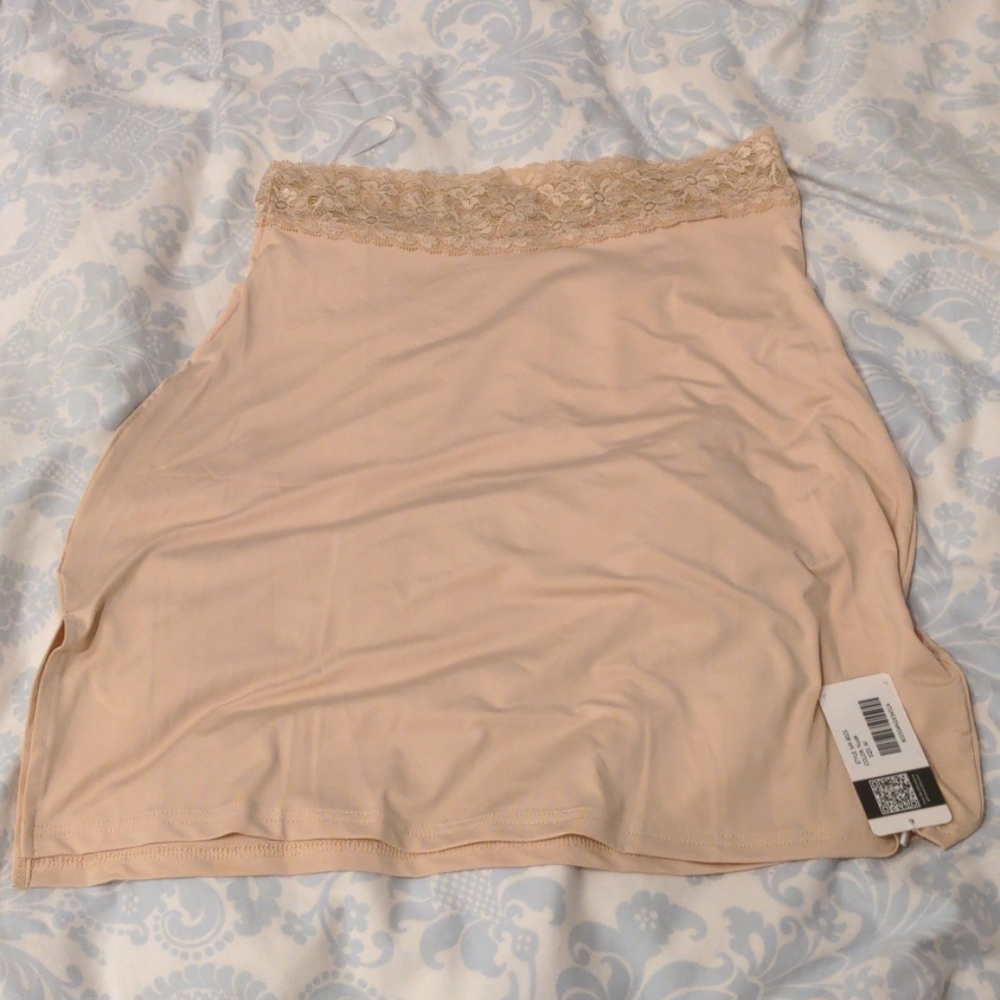 Nude mini skirt slip